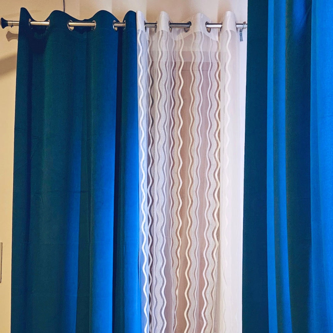 Blue velvet curtain in living room — HFI Bedding